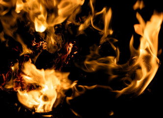 fire flame with sparks on black background.