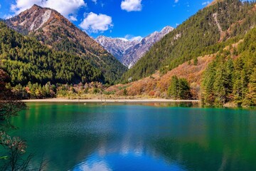 Scenic view of a lake in mountains of Jiuzhaigou valley in China