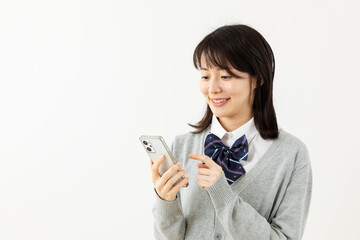 Fototapeta premium スマホを操作する女子高生02