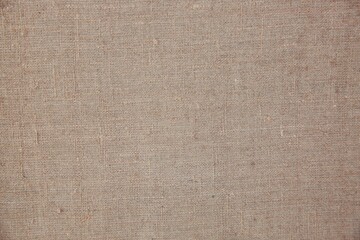 a close up of a very pretty surface of cloth with a small flower on it