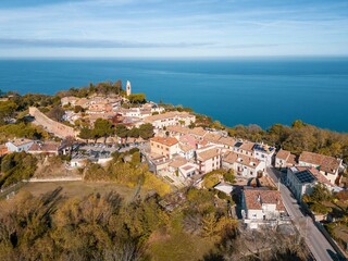 Obraz premium View of the picturesque medieval village of Fiorenzuola di Focara immersed in the San Bartolo Park