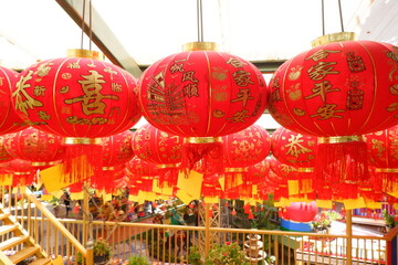 Chinese Lanterns Adorning a Rooftop