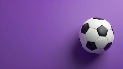 Soccer ball placed on purple backdrop