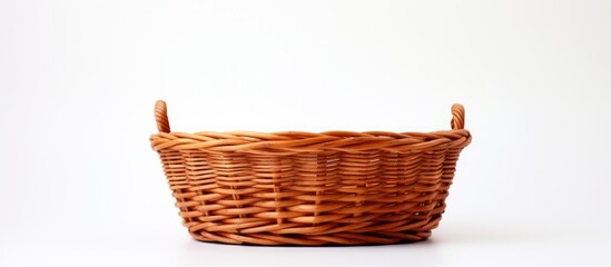 Obraz premium Wicker basket for serving isolated on white background. copy space available