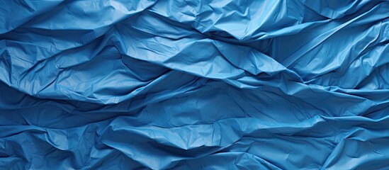 Obraz premium blue crumpled paper texture background. copy space available
