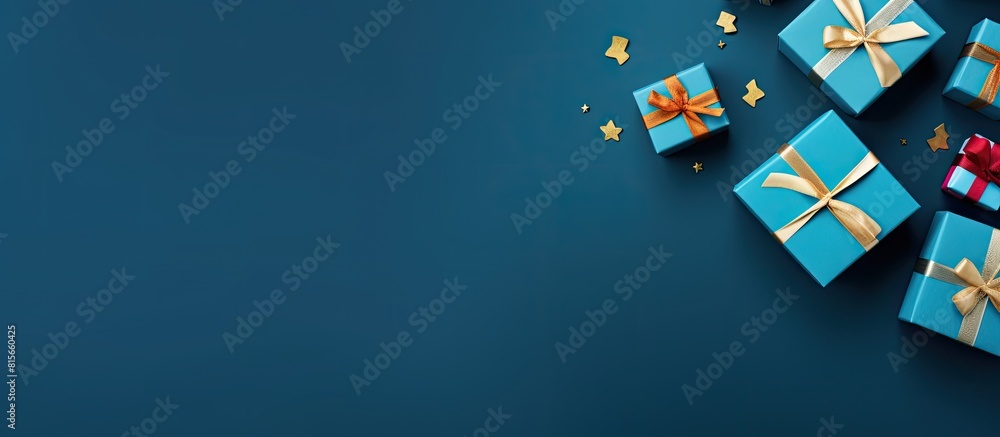 Poster Flat lay composition with gift boxes on blue background space for text Greeting card. copy space available