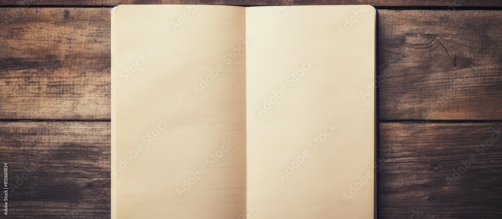 Aufkleber vintage style pictures of blank notebook paper on a wooden background with a vintage effect providin