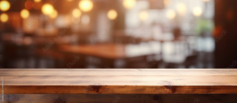 Poster empty wooden table space platform and blurred resturant or coffee shop background for product displa