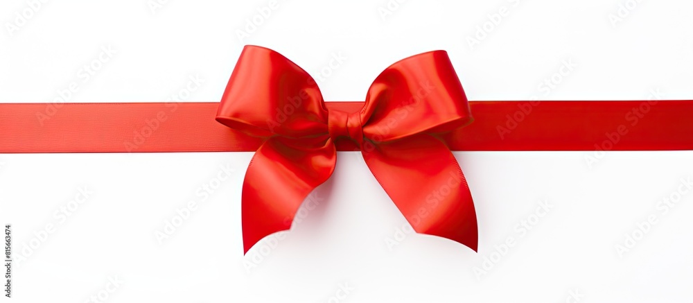 Poster a gift ribbon bow stands alone on a white background with copy space image