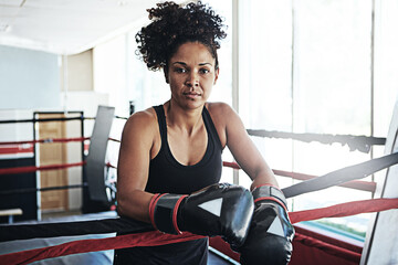 African woman, boxer and portrait for fitness, exercise or training workout ready for fight at gym....