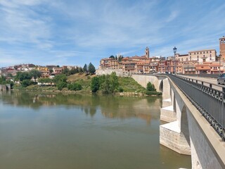 Obraz premium spain, travel, tourism, adventure, europe, nature, background, life, green, mountain, trekking, landscape, sky, arch, river, bridge, stone, view, reflection, water