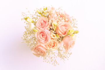 Wedding flower bouquet in soft pastel colors on the offwhite background flat lay top vies from above photography image