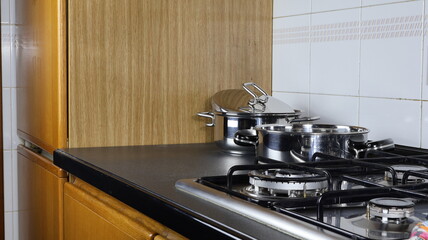 In the kitchen knife block with kitchenette and dishes