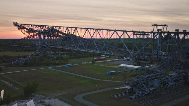 droneshot of a F60 excavator digger in germany huge machine droneshot