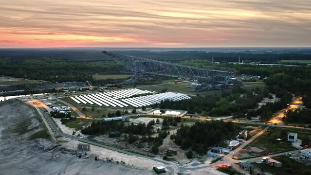 droneshot of a F60 excavator digger in germany huge machine droneshot