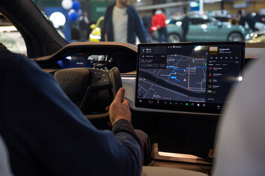 interor of Tesla Model X. Tesla screen, steering wheel, interor car electric ev vehicle