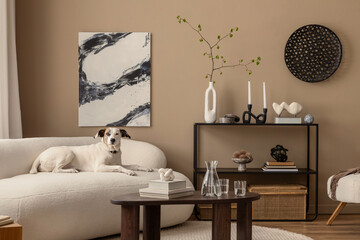 Stylish composition of design living room with  beautiful dog lying on the sofa, mock up paintings,, shelf, decorations and personal accessories. Home decor. template.