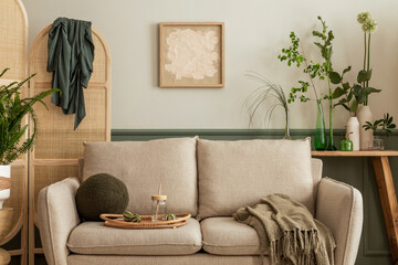 Interior design of spring living room interior with mock up poster frame, beige sofa, wooden coffee...