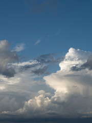 Blue sky. Beautiful Cumulus clouds flying across the sky,