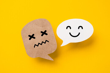 real paper cut with unhappy face and  unhappy face , for mental health, creative, solution, problem...