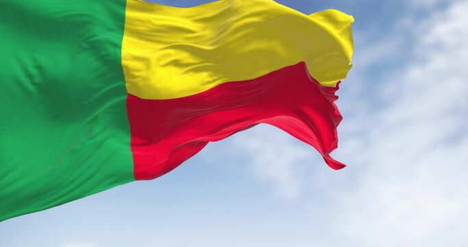 Close-up of Benin national flag waving on a clear day