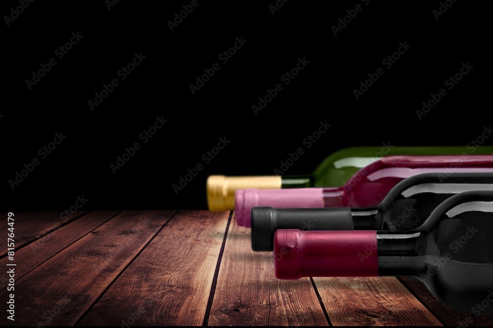 Canvas Prints Glass and bottle of wine at dark background