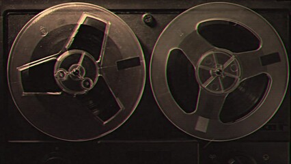 Vintage audio cassette tape recorder playing. Old school magnetic analogue reel player 1980s - 1990s. Retro style album and music technology history concept. Historical voice record FBI or CIA archive