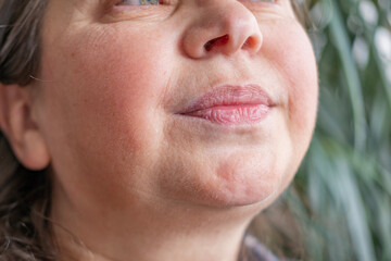 caucasian mature 50-year-old attractive woman, wrinkles on skin, facelift, age-related skin...