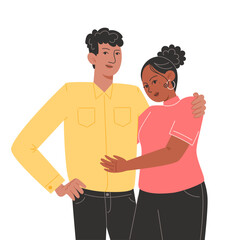 A young couple of a man and a woman are hugging