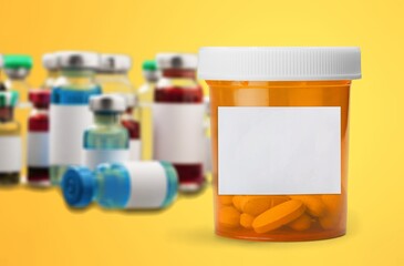 medication bottle with pills with blank label