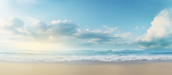 A beautiful nature background with a sandy beach serene sea and expansive sky Great for a copy space image