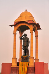 Statue of Subhas Chandra Bose under canopy behind India Gate war memorial, monolithic Netaji statue...