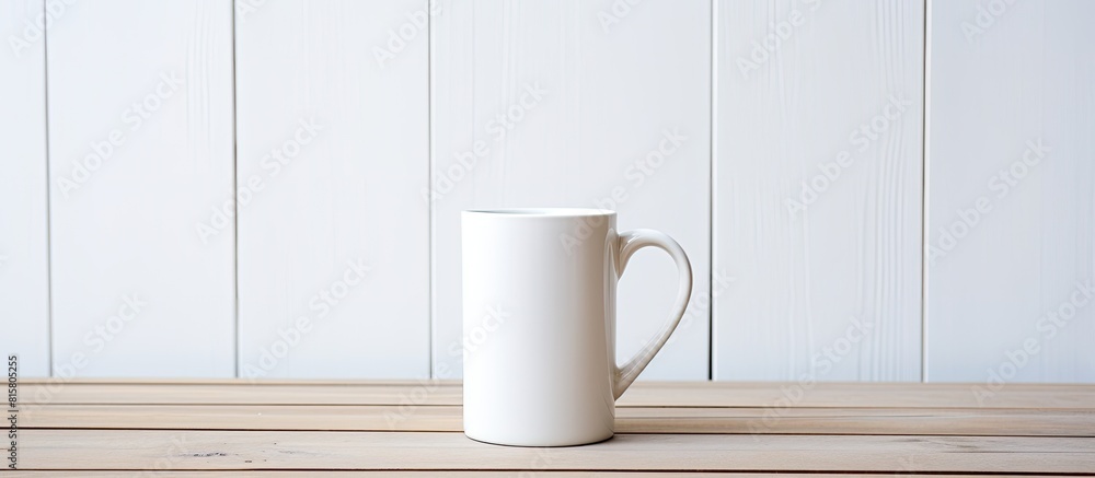 Wall mural Copy space image of a milk mug placed on a white wooden table