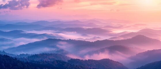 Amazing colorful sunrise in the mountains with a sea of fog.