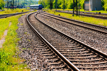 Railway tracks at the station of Neunkirchen (Saarland, Germany) on a sunny day. Train and shunting...
