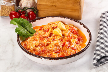 Shakshuka with tomato for breakfast