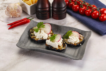 Grilled eggplant with cheese and radish