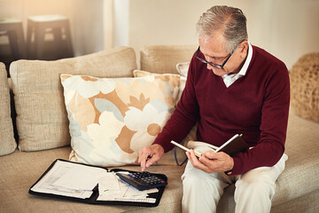 Senior man, notebook and calculator on sofa for budget, planning and savings account for...