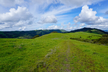 Fototapeta premium Grass Covered Ridge Lines and Hills