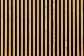 Wood slats, timber battens wall pattern surface texture. Close-up of interior material for design decoration background