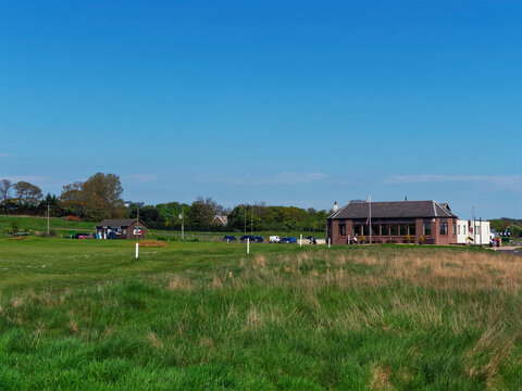 The Clubhouse and Starters Hut of the Artisan Golf Club at Arbroath Golf Links on the East Coast of Scotland on a fine afternoon in May