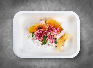 Stewed pear with cottage cheese mousse. Healthy diet. Takeaway food. Ecological packaging. Top...