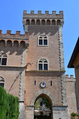 Entrance and facade of the Bolgheri toll booth. Ancient castle that surrounds the town of Bolgheri.