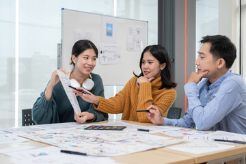 Application development team Brainstorming meeting and discussion to plan the design of ux ui and develop the system of applications on smartphones