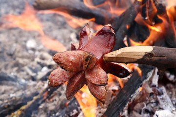 Pork sausage roasted over the cam fire
