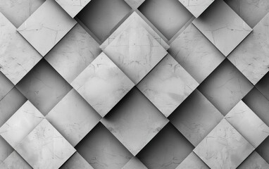 A textured gray geometric pattern of layered diamond shapes.