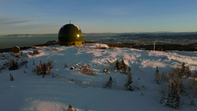 Aerial view of snowy forests in Norwegian mountains in Scandinavia, Grakallen next to Trondheim in Norway.