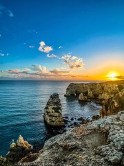 Portimao, Alvor coast, Portugal, Algarve. Rocks, rocky shore, yellow rocks, coquina, beautiful coastline