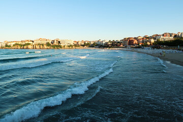View from the Sozopol Central Beach onto the waves in the sea before sunset, Sozopol, Sosopol,...