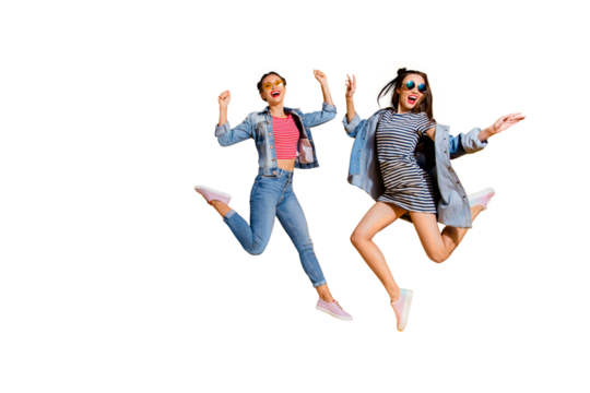 Leisure lifestyle concept. Full legs body size portrait of two emotion overjoyed beautiful attractive dreamy charming lovely cute sweet lady in glasses spectacles jump isolated on yellow wall